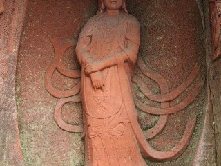 Bódhisattva Guanyin v pohoří E-mej-an, u města Le-an